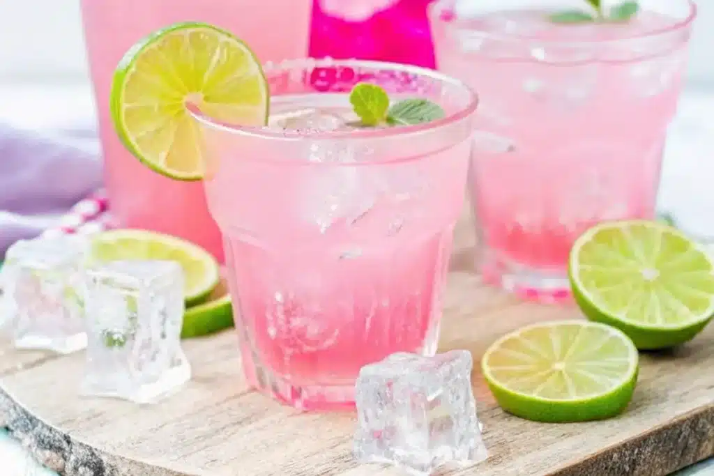 Pink Salt Recipe for Weight Loss with lime, ice, and mint in chilled glass