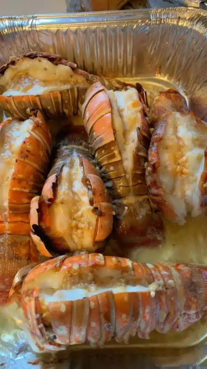 Baked lobster tails with garlic butter cooked in the oven until tender and juicy